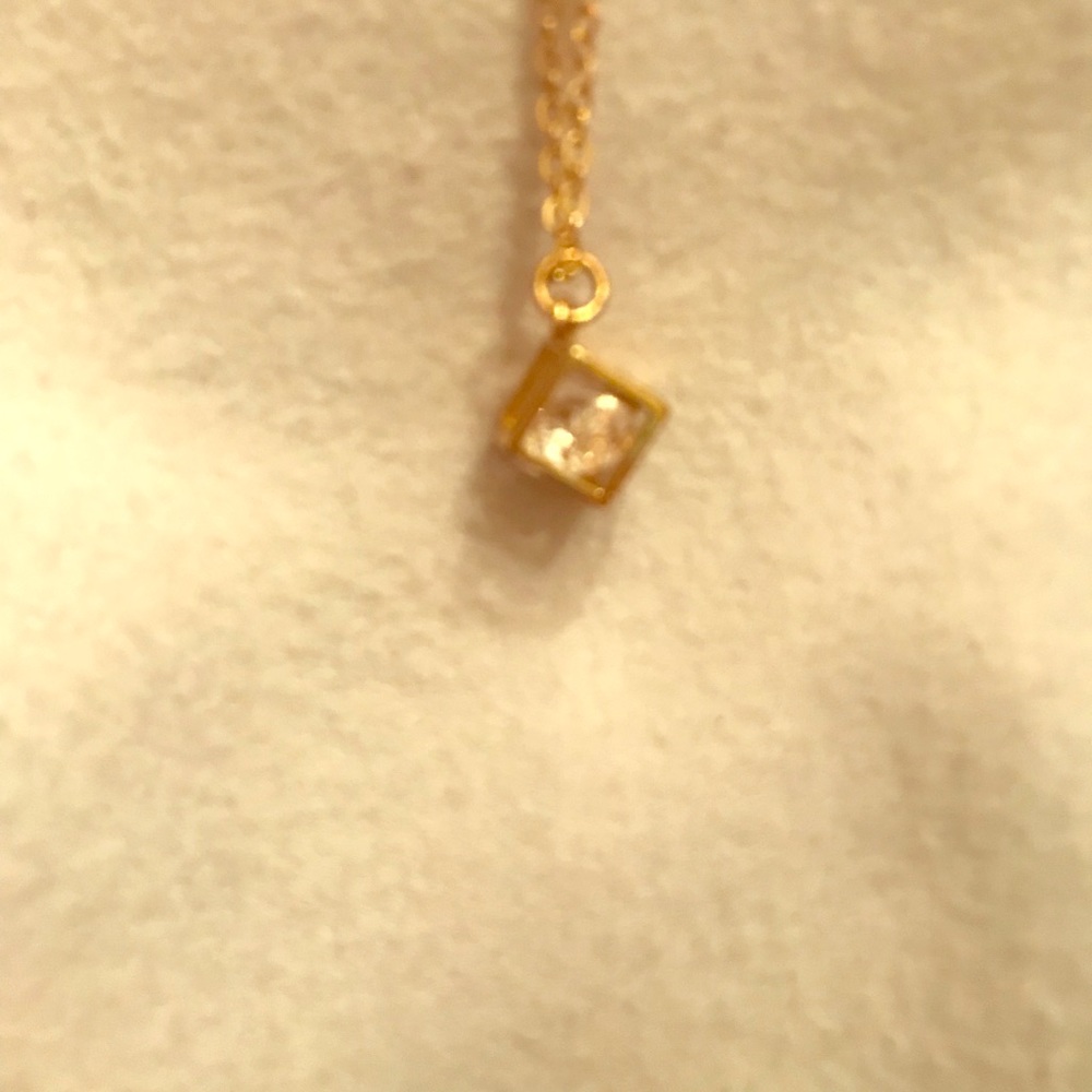 Round cut cubic zirconia in a cube prism necklace